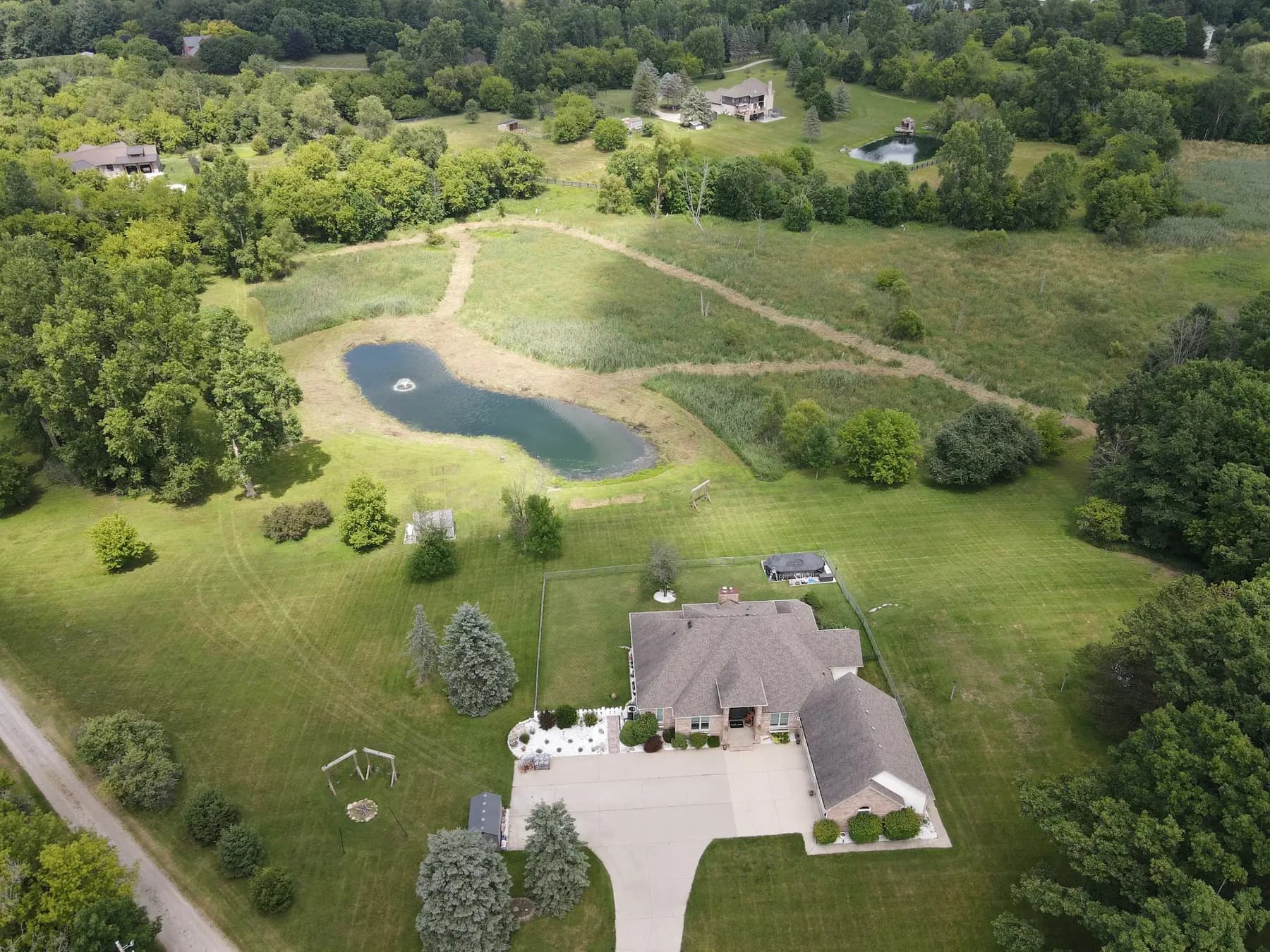 Aerial view of a Michigan property after forestry mulching work